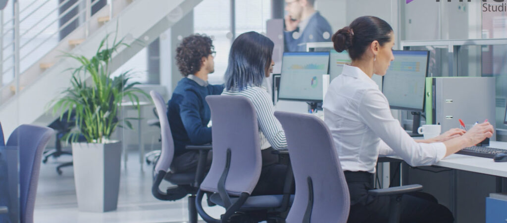 Representative image of professionals collaborating in a modern office setting